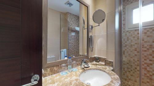 Salle de bains dans l'établissement Simaisma A Murwab Resort