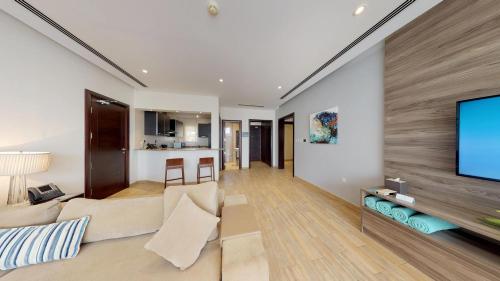 Télévision ou salle de divertissement dans l'établissement Simaisma A Murwab Resort