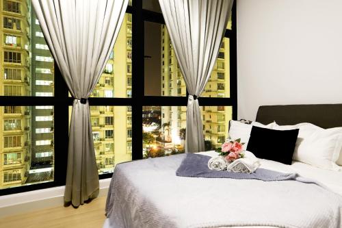 Un pat sau paturi într-o cameră la Richbaliz Homestay @ Selayang Residence 280