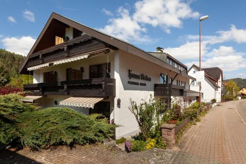 a building on the side of a street at Hotel Petra in Baiersbronn