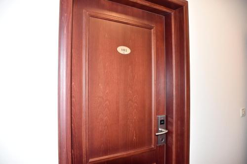 a wooden door with a sign on it at Villa Riva in Makarska