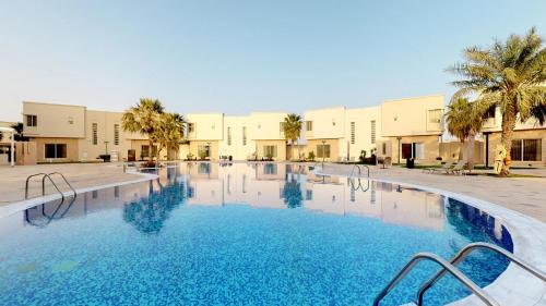 Piscine de l'établissement Simaisma A Murwab Resort ou située à proximité