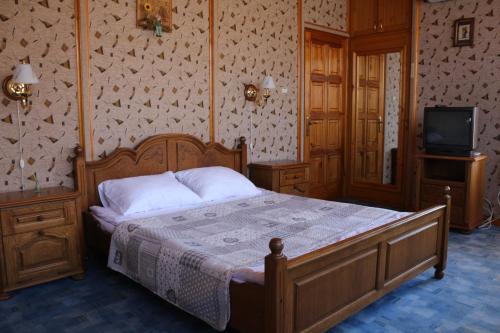 Postel nebo postele na pokoji v ubytování Усадьба-Музей