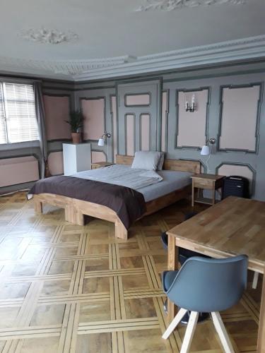 Postel nebo postele na pokoji v ubytování Hotel Garni Frohsinn