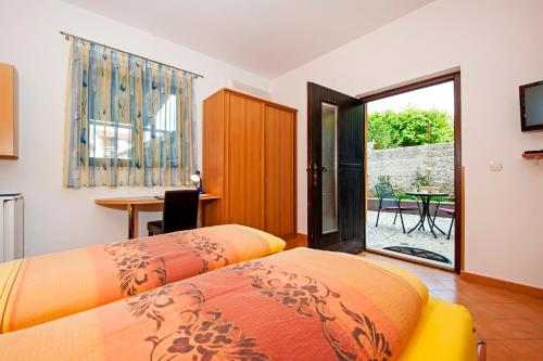 Postel nebo postele na pokoji v ubytování Apartments Erik B&B Adults only