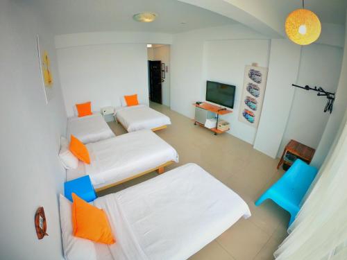 Postel nebo postele na pokoji v ubytování Imanuel Surfing B&B