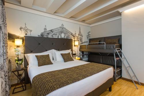 Säng eller sängar i ett rum på Venice Maggior Consiglio