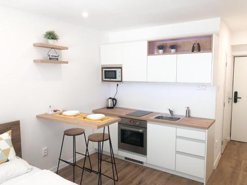 Virtuvė arba virtuvėlė apgyvendinimo įstaigoje Smart Home Žilina