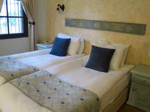 Katil atau katil-katil dalam bilik di Hotel Kalehan
