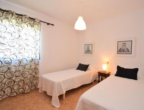 Ένα ή περισσότερα κρεβάτια σε δωμάτιο στο 145 Casa Ca Na Coloma ETV5130 by Mallorca Charme