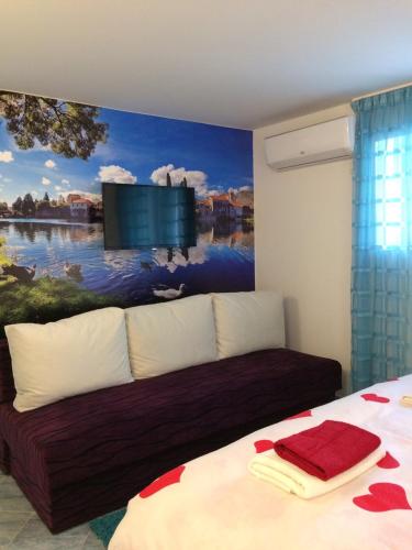 Llit o llits en una habitació de Apartment Voortex