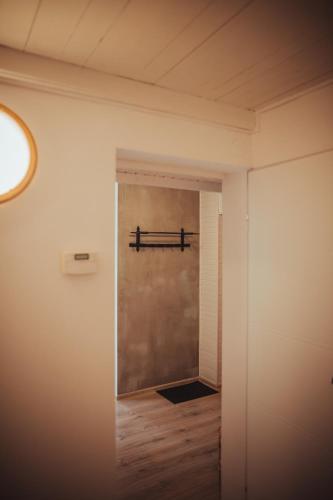 a door leading into a room with a hallway at nocleg blisko dworca Krosno in Krosno