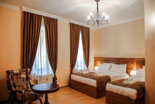 Postel nebo postele na pokoji v ubytování B&B rooms