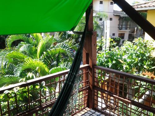 Balkoni atau teres di Casa Verde Apart - Apartamentos com cozinha