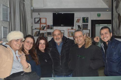 a group of people posing for a picture at Lion University & Youth Hostel Milano in Milan