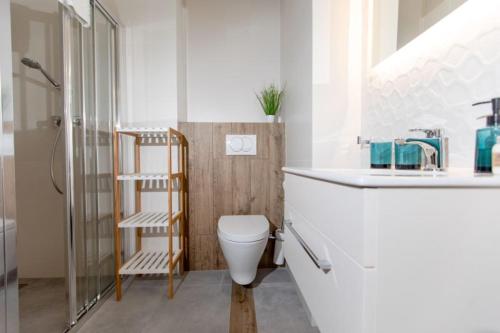 Koupelna v ubytování Resort Apartamenty Klifowa Rewal 21