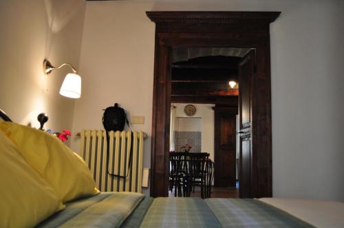 Una cama o camas en una habitación de Il Tomolo