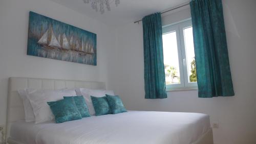 Postel nebo postele na pokoji v ubytování Apartment Spartium Split