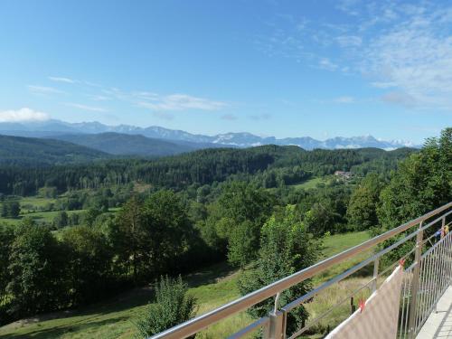 a view of the mountains from the balcony of a house at SportApartment Wabnig in Moosburg
