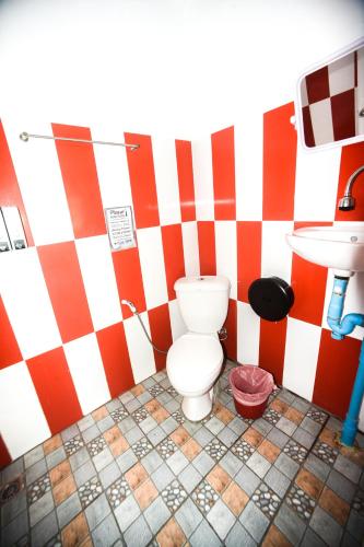 a bathroom with a toilet and a sink at Carabao Diving Koh Tao in Ko Tao