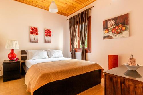 Postel nebo postele na pokoji v ubytování Olive Grove Apartment
