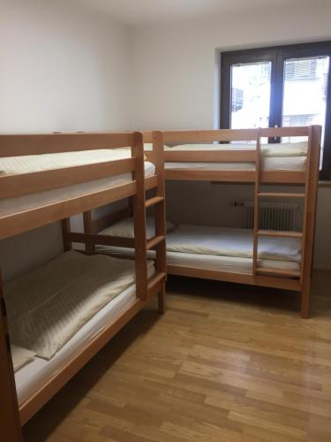 Appartement Central tesisinde bir ranza yatağı veya ranza yatakları