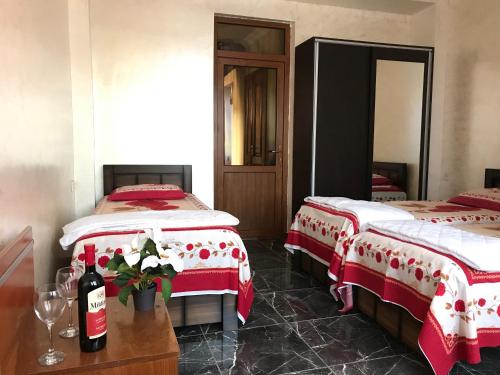Postel nebo postele na pokoji v ubytování Kobuleti Guest House chexov 24