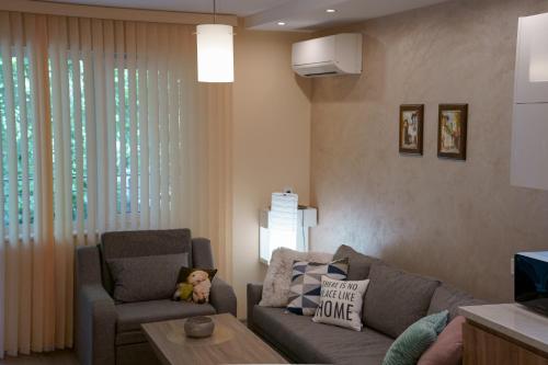 Ruang duduk di The Place -Apartments in Plovdiv, with private parking