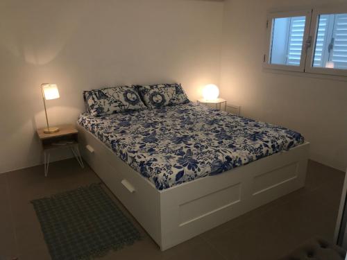 Postel nebo postele na pokoji v ubytování Casa Lau