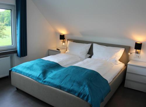 Katil atau katil-katil dalam bilik di Ferienwohnung Hohe Acht