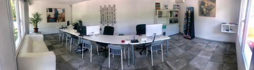a room with a table and chairs in a room at Camping Igara de San Sebastian in Donostia-San Sebastián