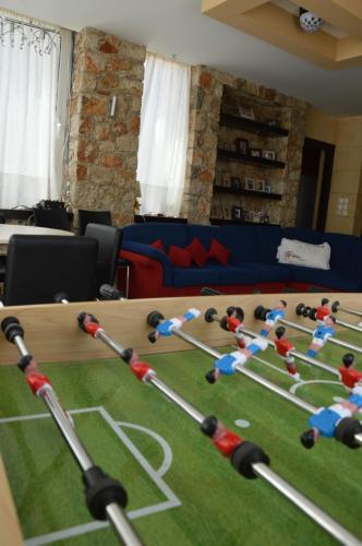 a room with a football game on a table at Kostas Studios in Faliraki