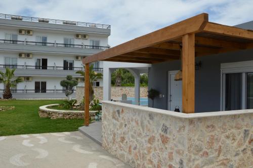 a view of the front of a building at Kostas Studios in Faliraki