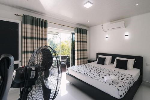 Cama o camas de una habitación en e-stay Hanthana Kandy