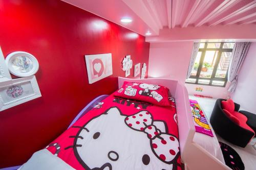 Postel nebo postele na pokoji v ubytování Quan World My Home B&B