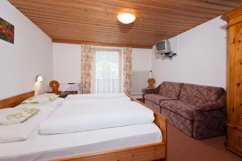 Postel nebo postele na pokoji v ubytování Haus Barbara