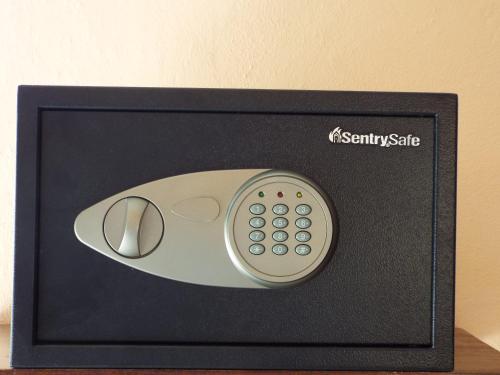 a remote control sitting inside of a black box at LAKE VIEW CONDO in Belize City