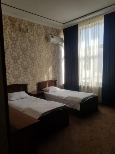 Una cama o camas en una habitación de Hotel Anor