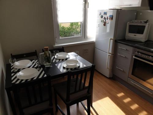 Кухня или мини-кухня в Apartament Olivia Centrum z zamknietym parkingiem

