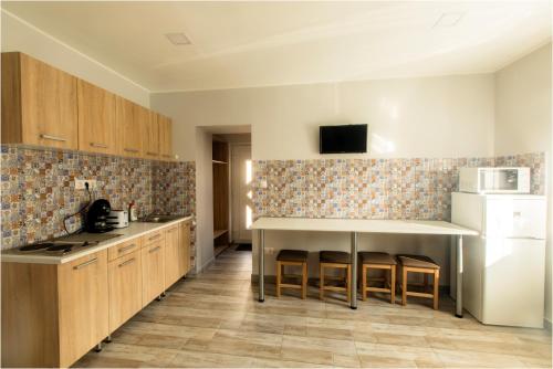 Η κουζίνα ή μικρή κουζίνα στο Toszkána Apartmanház