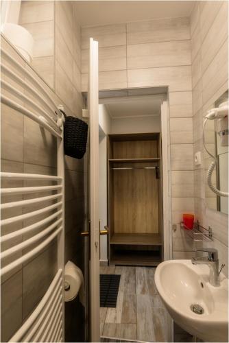 Ένα μπάνιο στο Toszkána Apartmanház