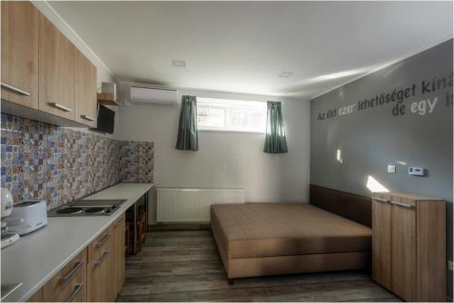 Η κουζίνα ή μικρή κουζίνα στο Toszkána Apartmanház