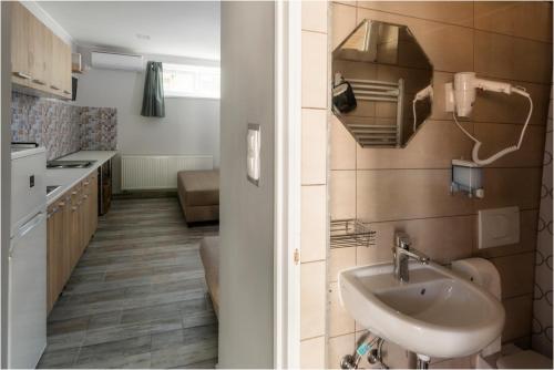 Ένα μπάνιο στο Toszkána Apartmanház