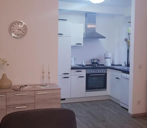 Kuchyň nebo kuchyňský kout v ubytování Ferienwohnung Ostseepalast