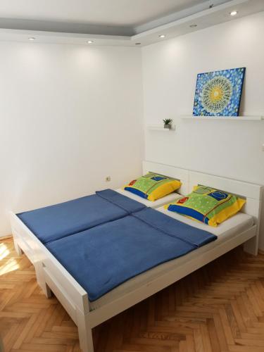 Łóżko lub łóżka w pokoju w obiekcie Apartment Split