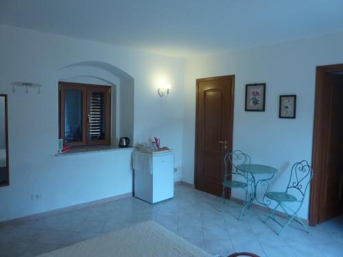 Un lugar para sentarse en Duomo Rent Room & Flat