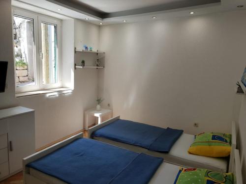 Cama o camas de una habitación en Apartment Split
