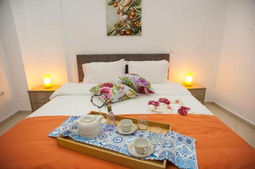 A bed or beds in a room at DREAM APPARTMENT 3 PEREA