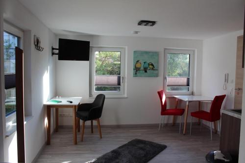 Televisyen dan/atau pusat hiburan di Apartments beim Backhäusle