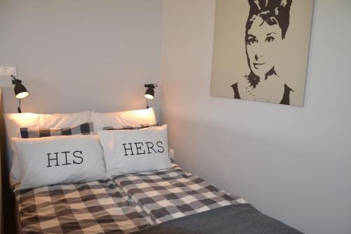 Posteľ alebo postele v izbe v ubytovaní Apartament w Parku Planty